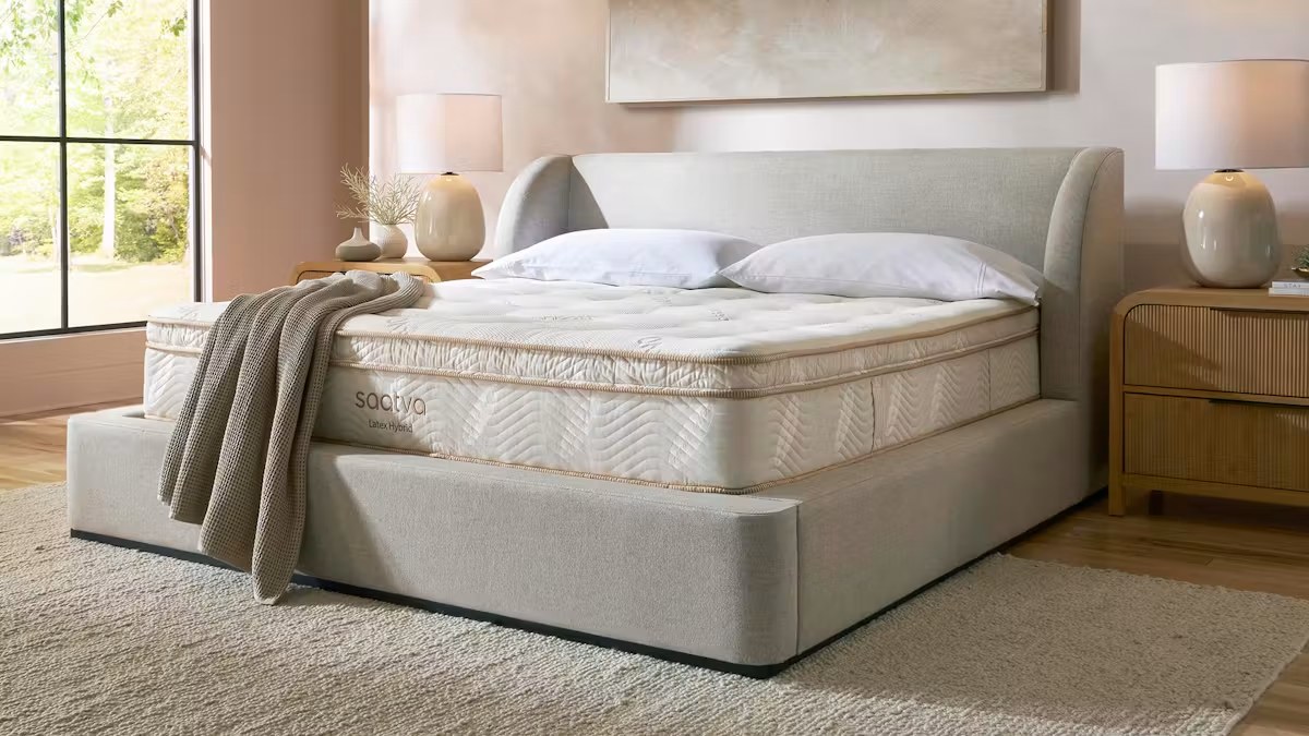 Saatva mattress styled in a bedroom